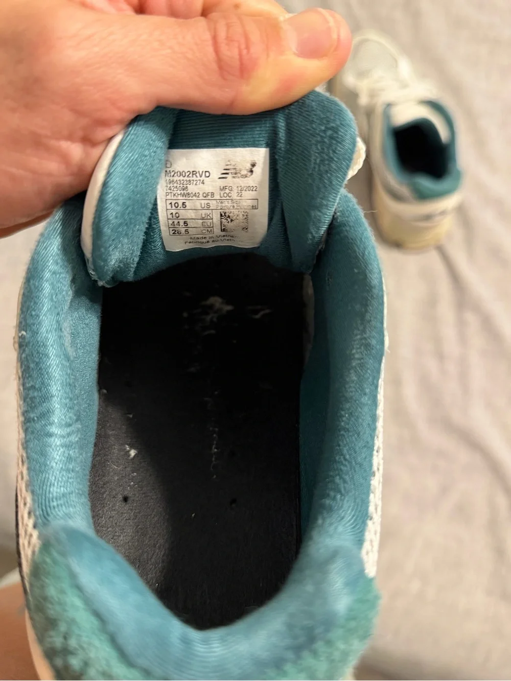 New Balance White Sneakers with Teal Lining and Navy Accents